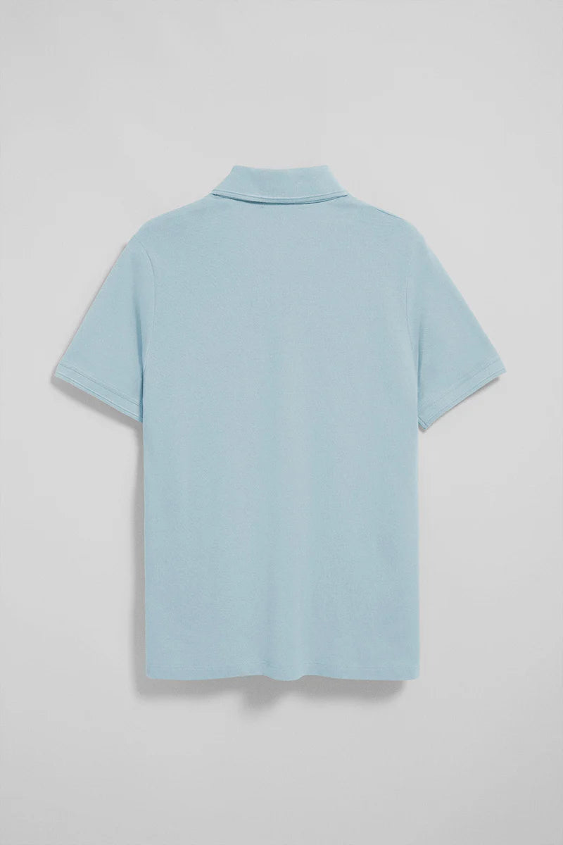 Polo azul bebé de manga corta y tres botones con logo bordado Rigby Go