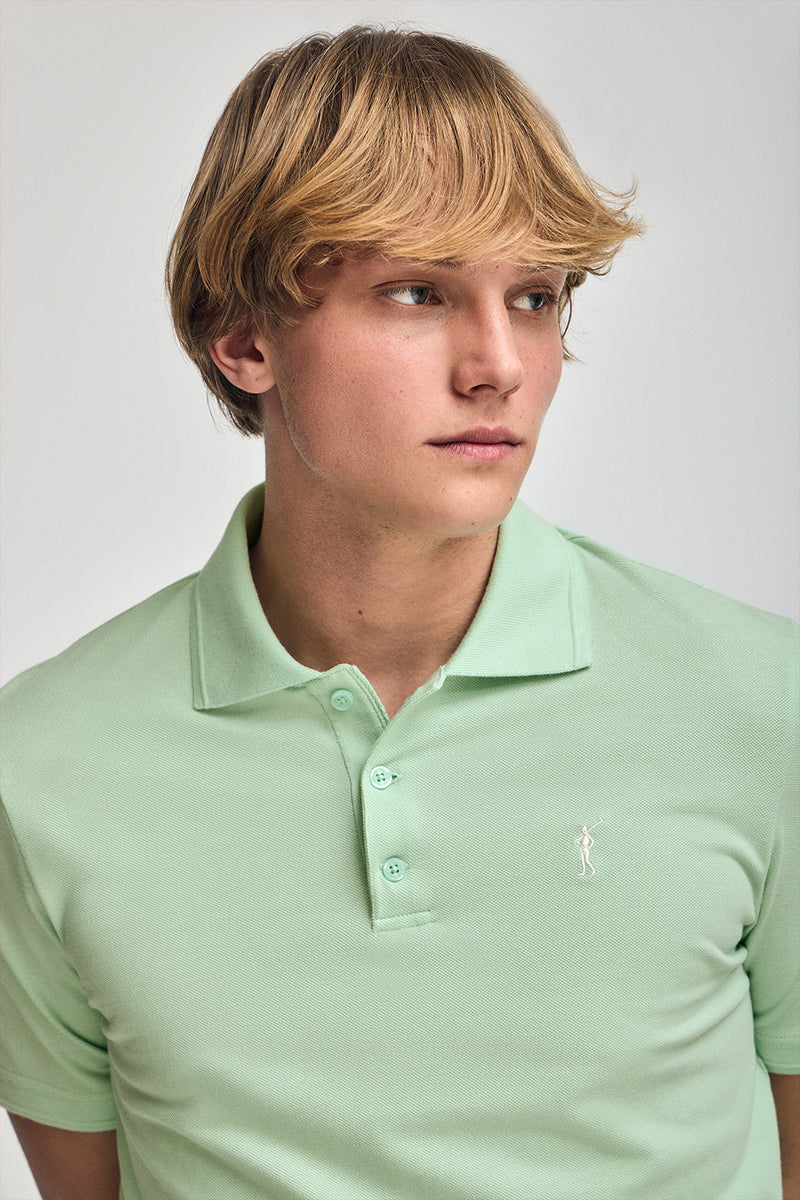 Polo verde menta de manga corta y tres botones con logo bordado Rigby Go