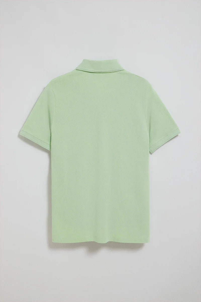 Polo verde menta de manga corta y tres botones con logo bordado Rigby Go