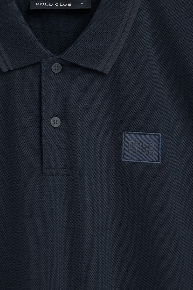 Polo azul marino de piqué con parche Polo Club
