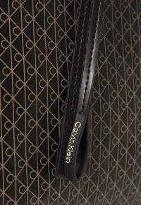 Calvin Klein EMBLEM FLAP BACKPACK - Mochila - black aop